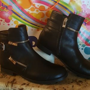 Ivanka Trump black leather boots.